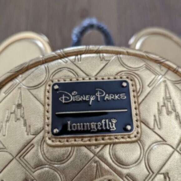 Loungefly Disney World 50th Anniversary Genuine Leather Gold Mini Backpa… - Picture 10 of 15